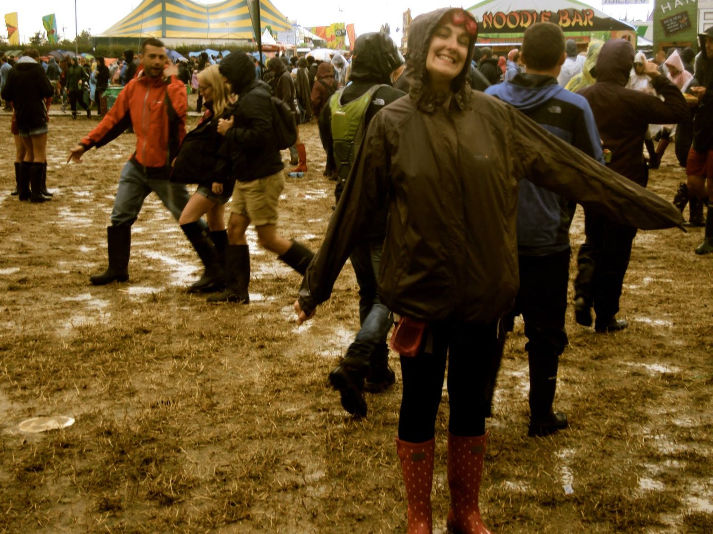 Jo in the mud at Glastonbury
