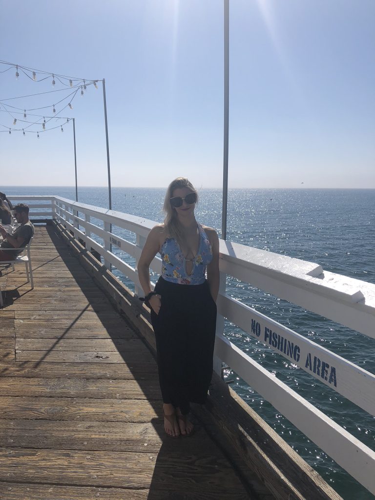 Girl enjoying the views on Malibu Pier, California