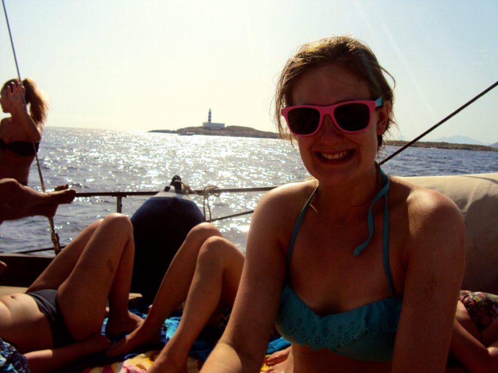 Jo on board the sailboat sailing back to Ibiza