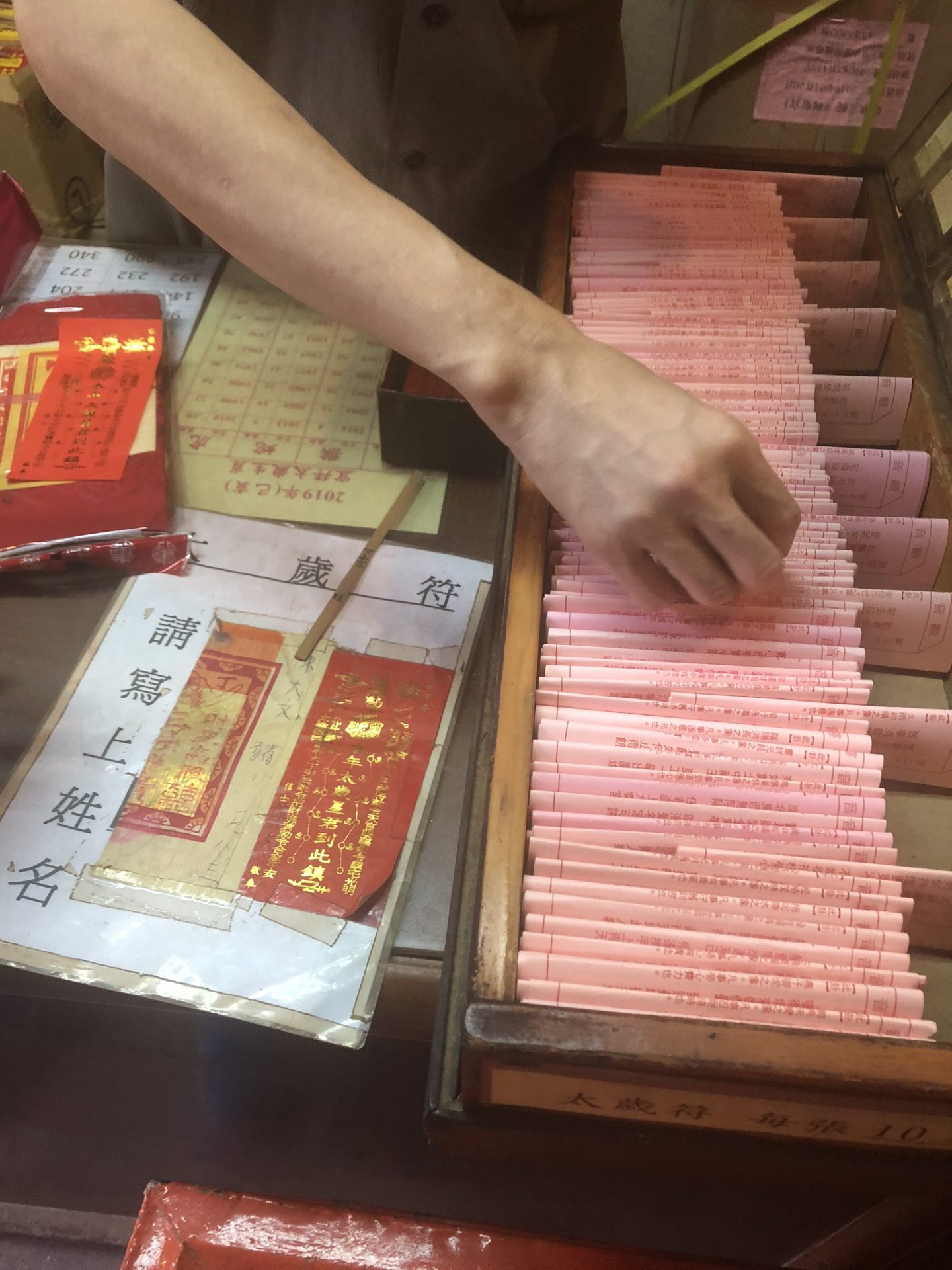 Having our fortune read at Man Mo Temple, Hong Kong