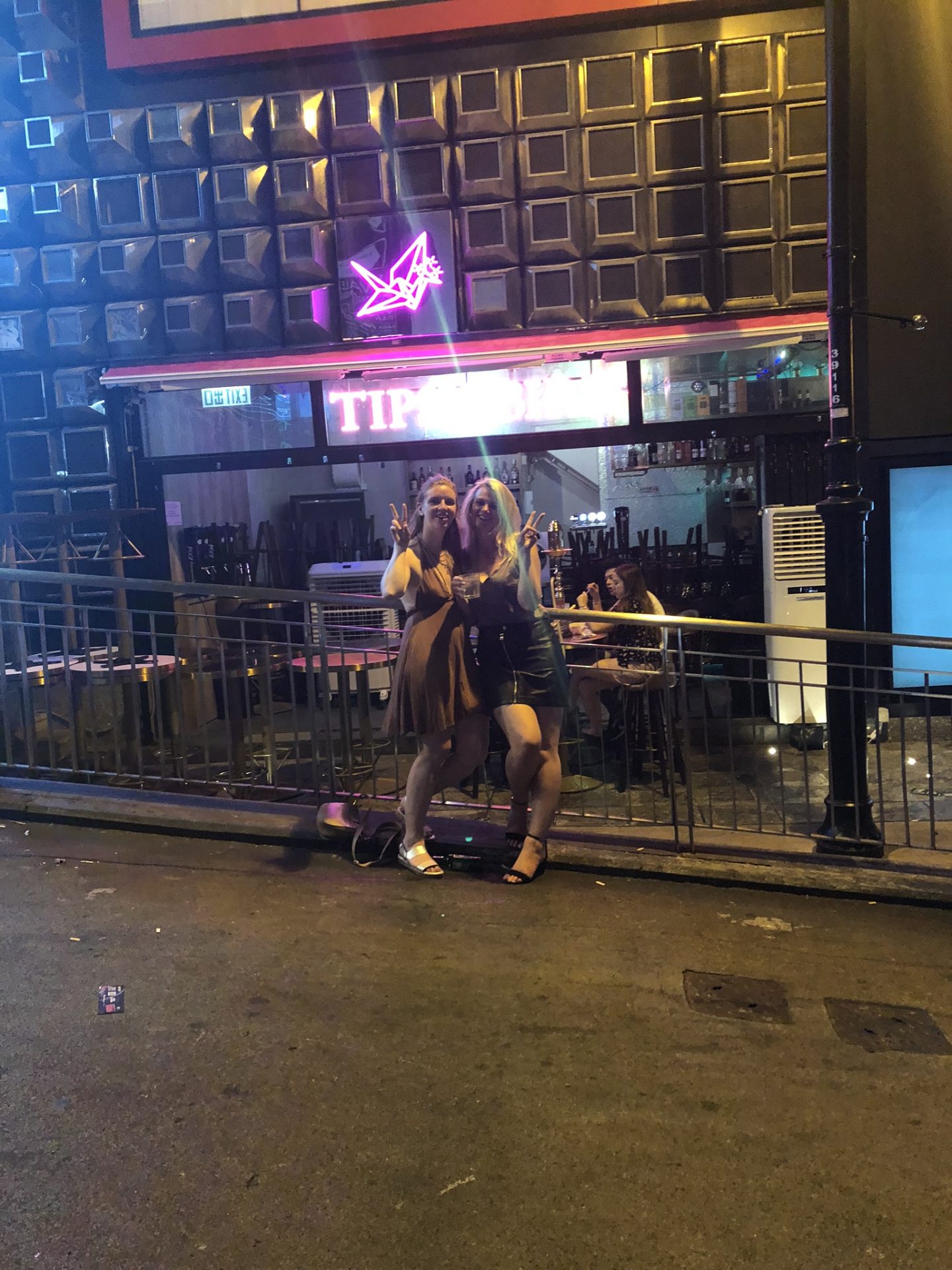 Girls outside the Tipsy Bird in Lan Kwai Fong, Hong Kong