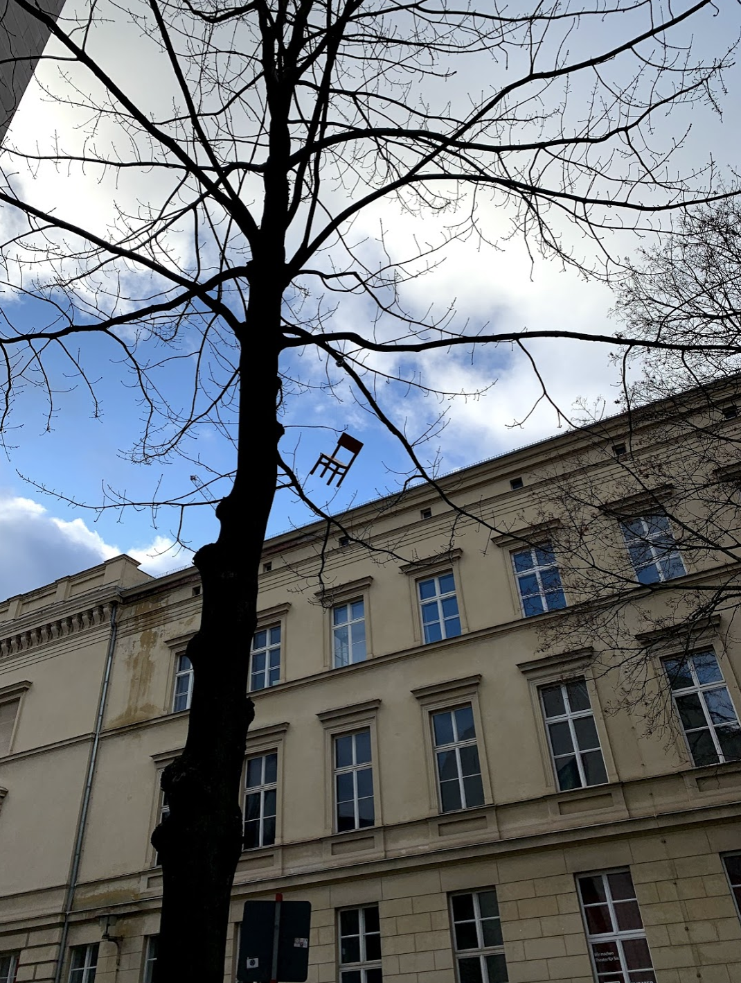 Tiny chair in a tree in Berlin, Germany